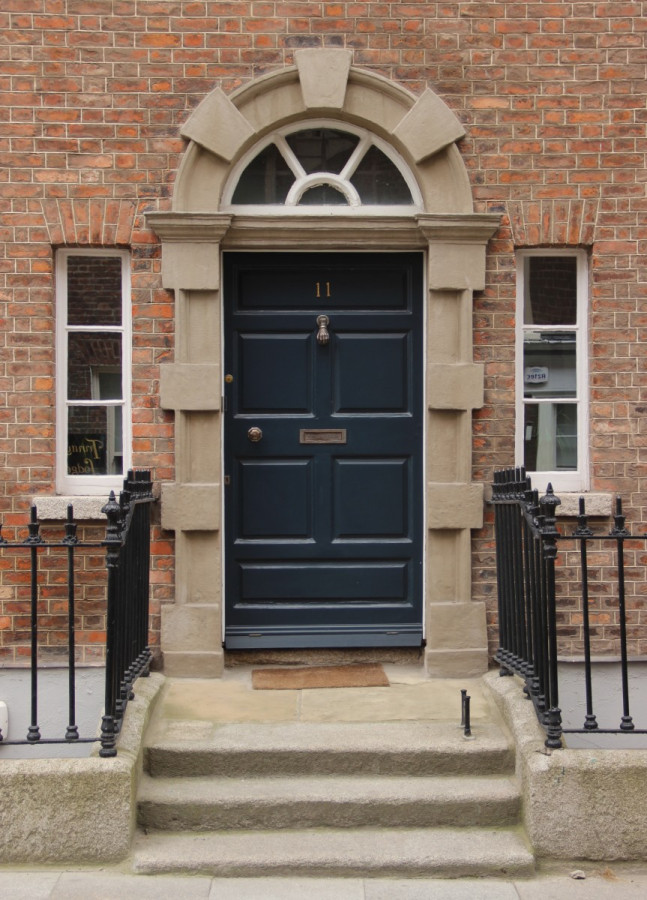 Handsome Gibbsian doorcase to Number 11 with original fanlight