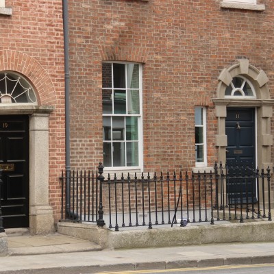 Contrasting doorcases of Numbers 10 and 11 