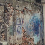 Early panel of brickwork and timbers embedded in the western party wall of Number 4